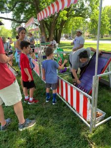 June Jam photo of kids playing at a game stand